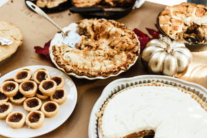 Assorted pies on the a table setting